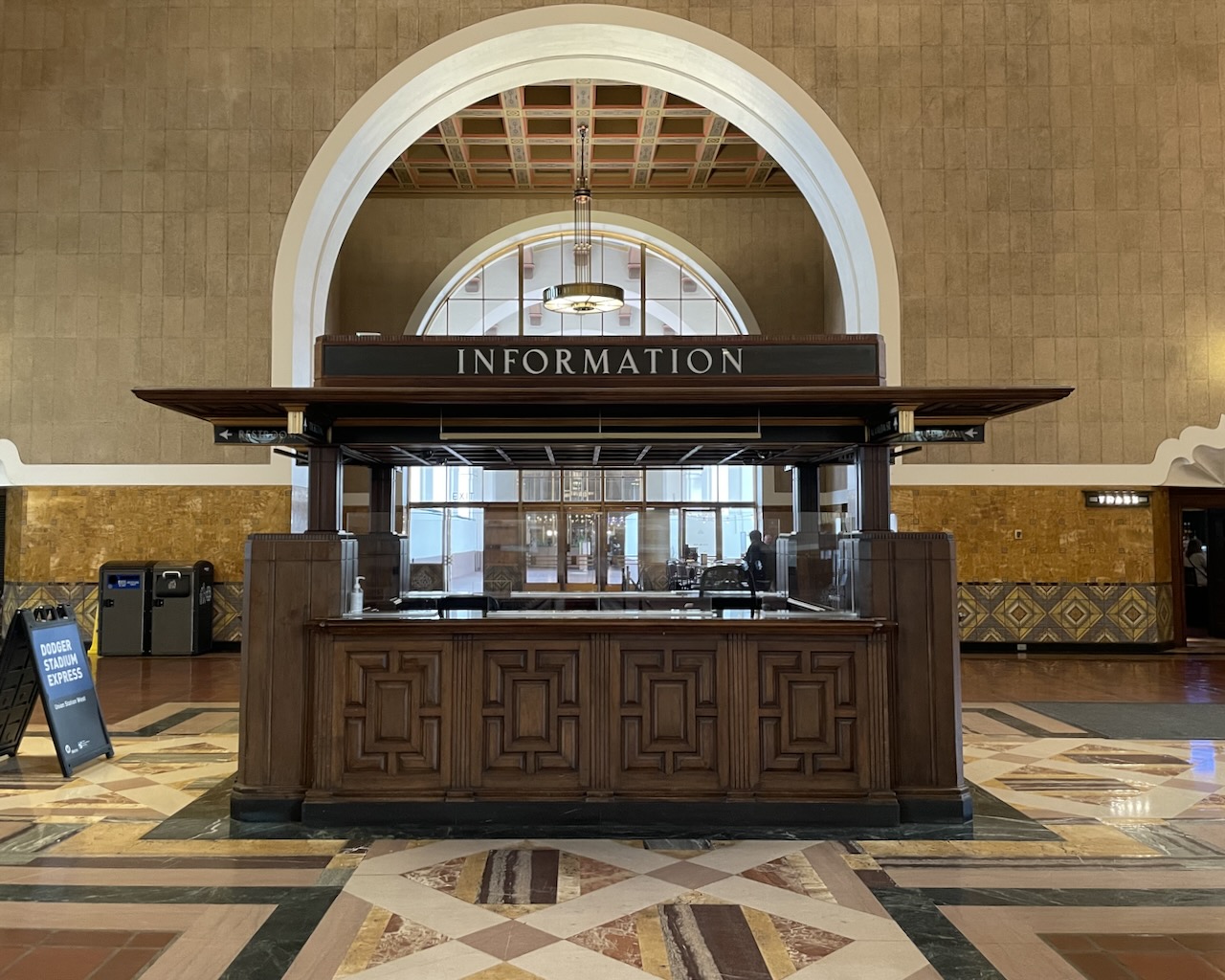 Information booth at Union Statation. The booth is framed by an arched entryway.