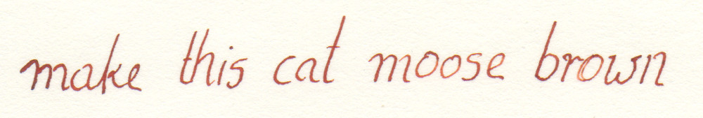 Brown ink calligraphy of the phrase: make this cat moose brown