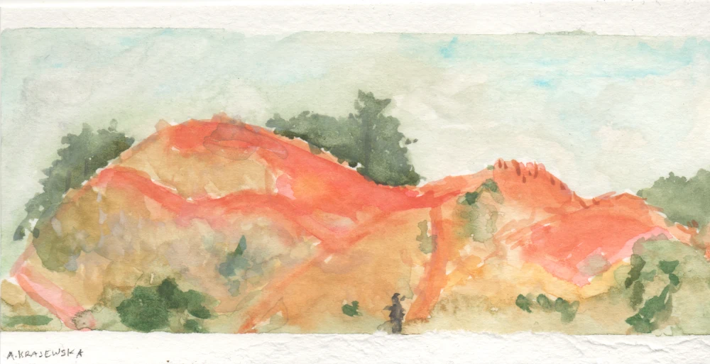 A watercolor painting of a hillside with red rocks and scrubby trees